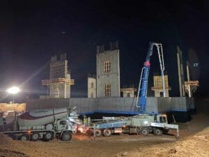 Red Cliffs Temple Sunroc Concrete pump truck pouring walls and foundation