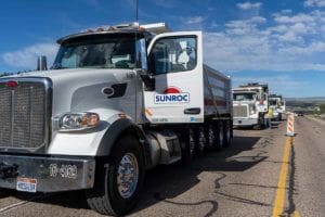 Sunroc Dump Truck Driver Delivery of Hot Asphalt on SR-12 Near Bryce Canyon Utah